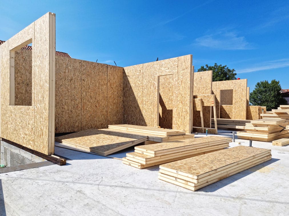 walls of a modern prefab house on a concrete foundation
